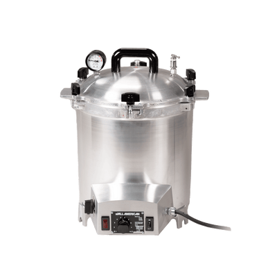 Small 25-quart All American electric pressure sterilizer, model 50X, with a control panel, electrical cord, pressure gauge, and a reflective metallic surface