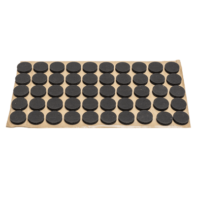 A close-up of a sheet of Microppose self-healing injection ports, showcasing the textured surface and the adhesive backing for application to cultivation jars.