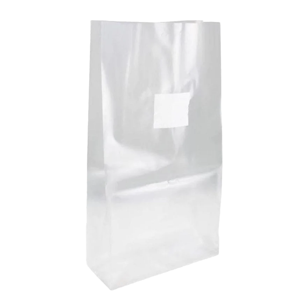 A clear, autoclavable plastic bag with a square white filter patch at the top designed for growing mushrooms.