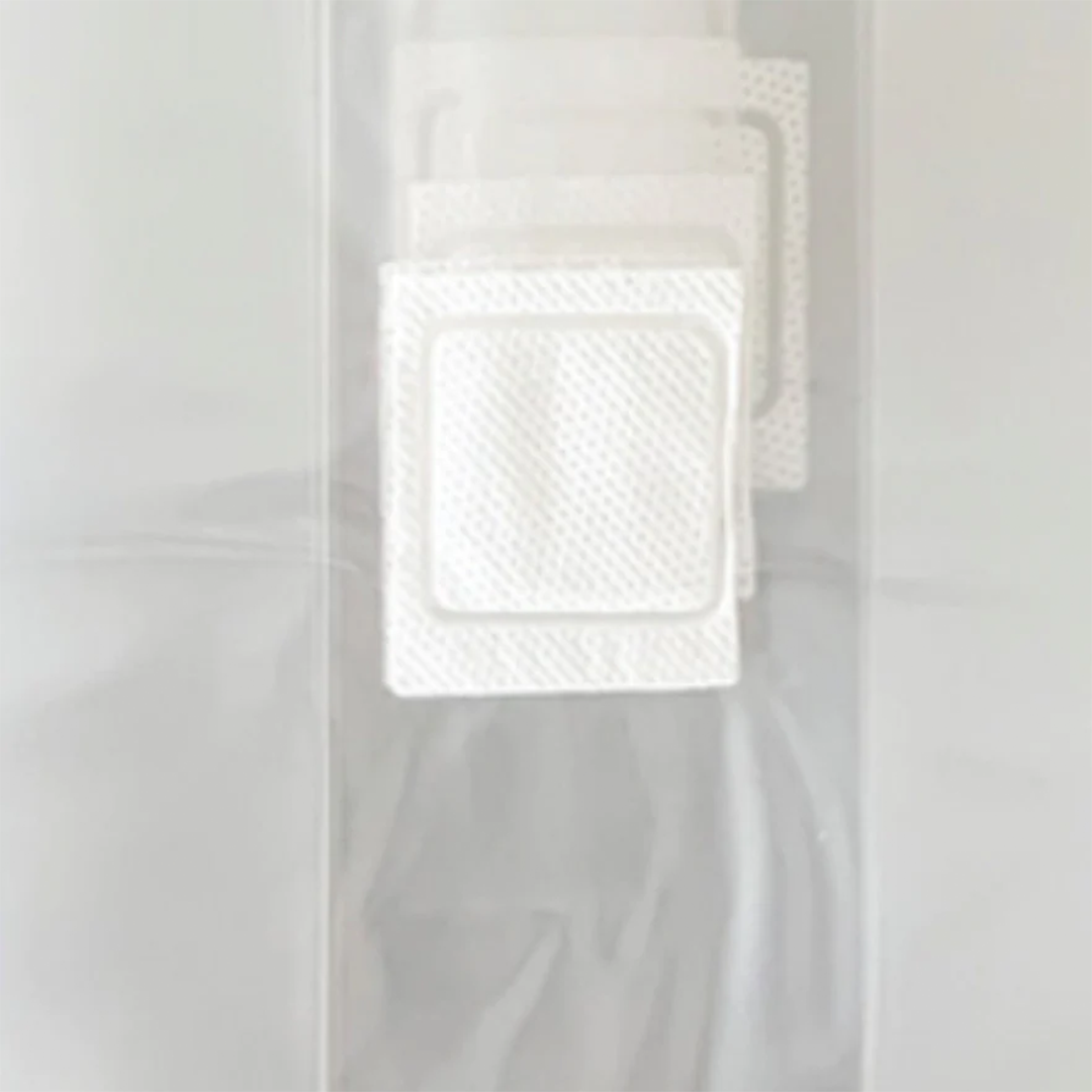 A closeup of the square white filter patches for air exchange on the mushroom grow bags - available in .2, .5 and 5 micron varieties.