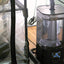 ultrasonic mushroom Humidifier with digital display on a wooden surface attached to a martha tent
